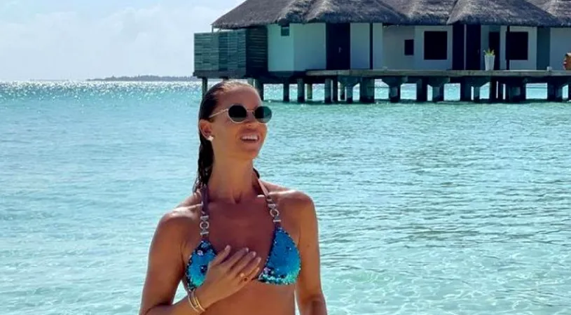 Soția lui Dan Petrescu e într-o vacanță continuă. Cum s-a afișat în costum de baie în Maldive și de ce stă mai mult despărțită de antrenorul român. GALERIE FOTO