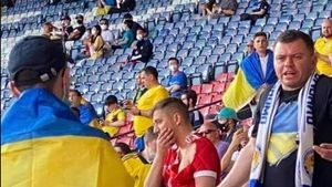 Scandal în zona destinată fanilor ucraineni! Un suporter rus s-a așezat în peluza suporterilor naționalei lui Andriy Şevcenko | VIDEO