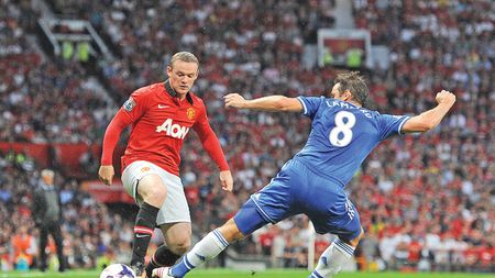 Rooney rămâne la United!

