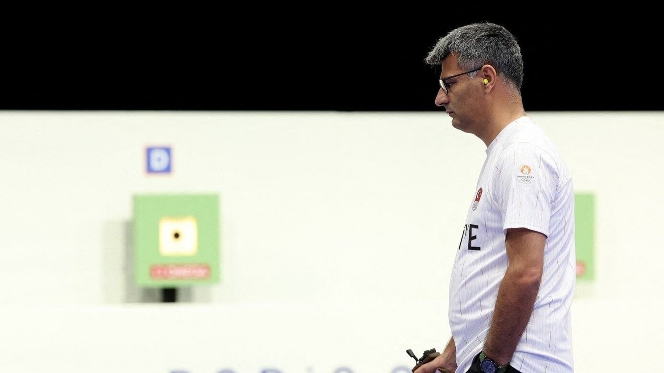 Ce meserie are, de fapt, turcul de 51 de ani, numit „asasinul plătit”, care a luat argintul la Jocurile Olimpice deși a tras fără echipament special și cu o mână în buzunar