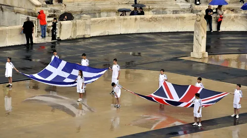 Flacăra olimpică, înmânată la Atena organizatorilor britanici