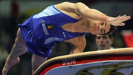 Echipa masculină a României,** locul 10 în calificări și ratează finala olimpică la gimnastică
