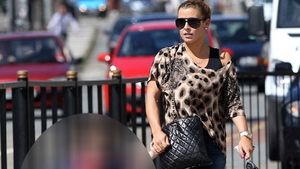 FOTO Rooney se pune iar rău cu fanii lui United!** Fiul atacantului a apărut îmbrăcat în tricoul echipei care i-a întristat rău de două ori pe "diavoli" în ultimii trei ani