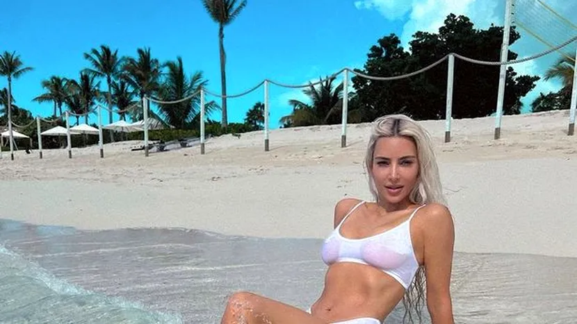 Kim Kardashian lasă loc imaginației și pozează într-un bikini alb transparent