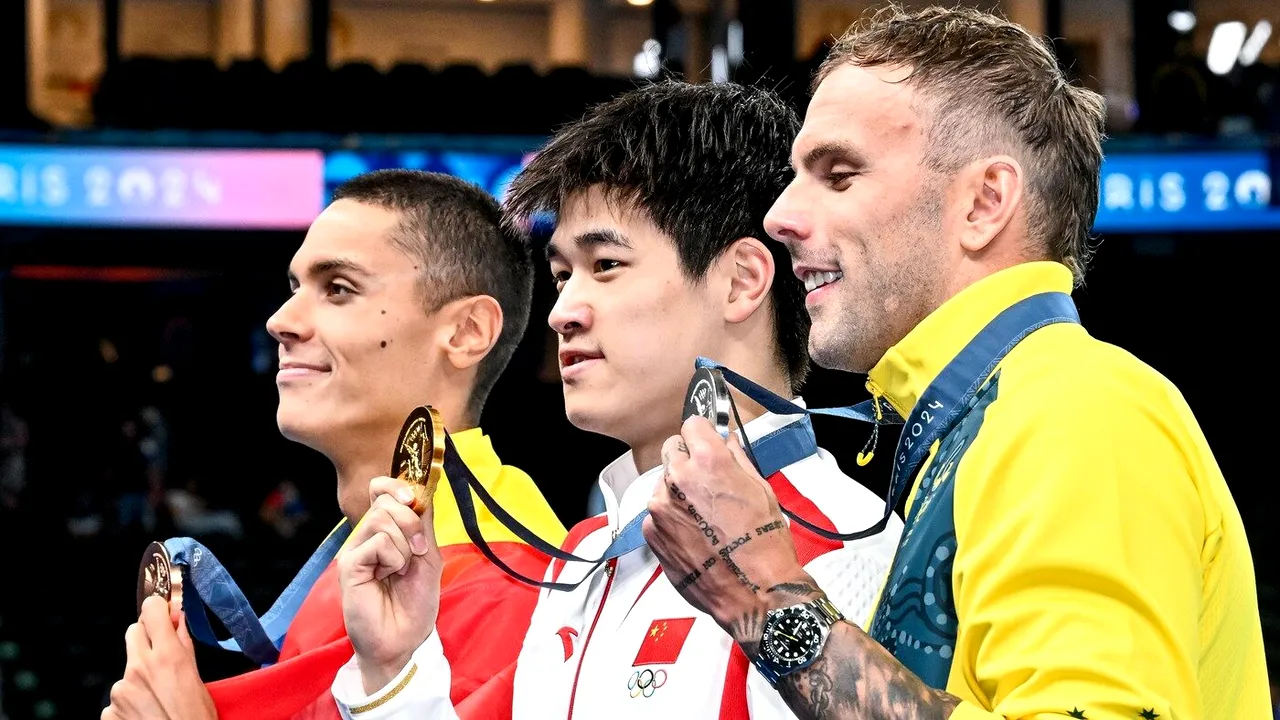 Reacția World Aquatics la imaginea cu David Popovici şi Zhanle Pan. Cum a numit interacțiunea dintre cei doi