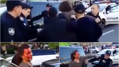 VIDEO | Momentul incredibil în care ȘAPTE polițiști încearcă să doboare un fost campion olimpic la lupte, după ce a fost oprit în trafic! 