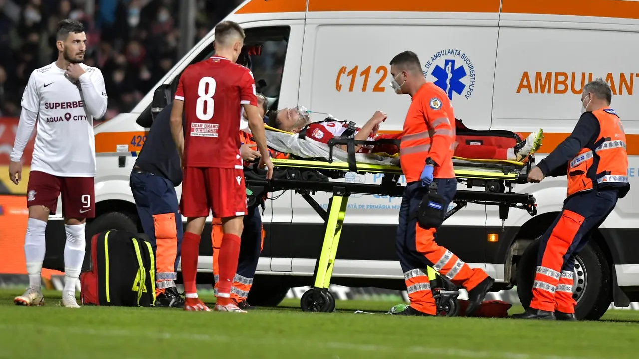Șoc în timpul derby-ului Dinamo - Rapid! Alexandru Răuță, luat cu ambulanța de pe teren și dus la spital. „Avea probleme respiratorii!” + Prima reacție a fotbalistului| FOTO