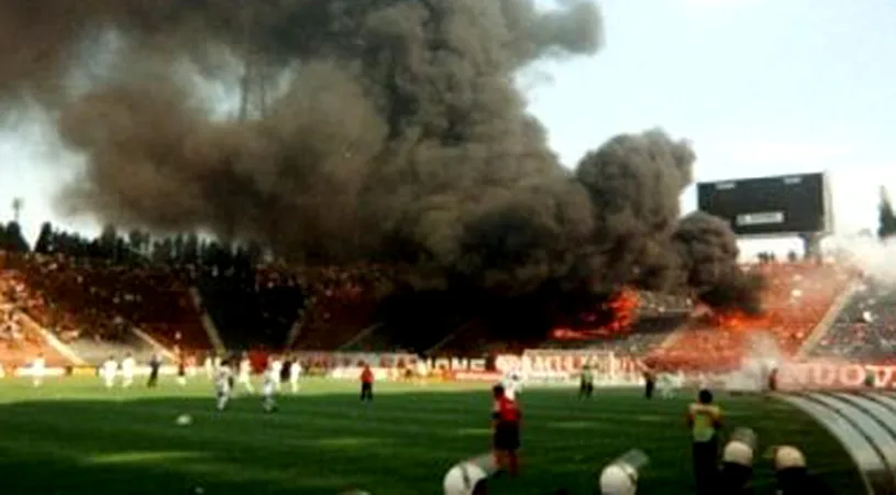 26 de ani de când galeria lui Dinamo a incendiat peluza oaspete de pe vechiul stadion din Ghencea. Mărturii de la fața locului din partea a doi dintre protagoniștii acelei partide. „Simțeam căldură foarte mare din spatele porții!”. Amintiri cu fuga lui Cornel Țălnar spre Valeriu Argăseală, tușier în derby-ul respectiv | EXCLUSIV