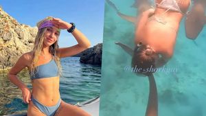 Momentul când un rechin atacă o tânără și o mușcă direct de spate! Sportul periculos pe care îl practica | VIDEO