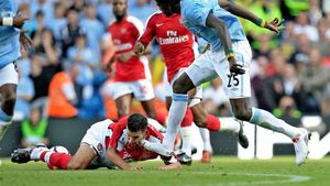 VIDEO** "Răzbunarea" lui Adebayor! Îl calcă pe Van Persie și se bucură după gol în fața fanilor lui Arsenal