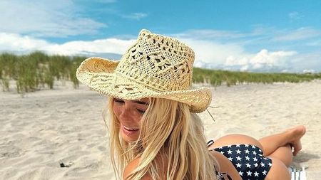 Cum a reacționat cea mai bogată gimnastă din America când a fost 'agățată' de Andrew Tate: „E primul lucru pe care l-am făcut” | GALERIE FOTO