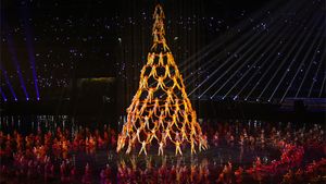 Olimpiada de Tineret: chinezii au încercat să împrăștie norii cu tehnologia de control meteorologic. Rezultatul: ceremonia de deschidere de la Nanjing s-a desfășurat sub o ploaie torențială
