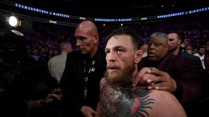 Ziua de coșmar a lui McGregor, completată de 50 Cent. Ironia prin care l-a pus la podea pentru a doua oară: "Ia cureaua! Așa arăți când..."