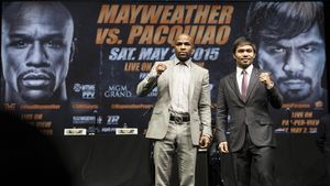 Mark Wahlberg și P. Diddy au pariat 250.000 de dolari pe meciul de box dintre Mayweather și Pacquaio