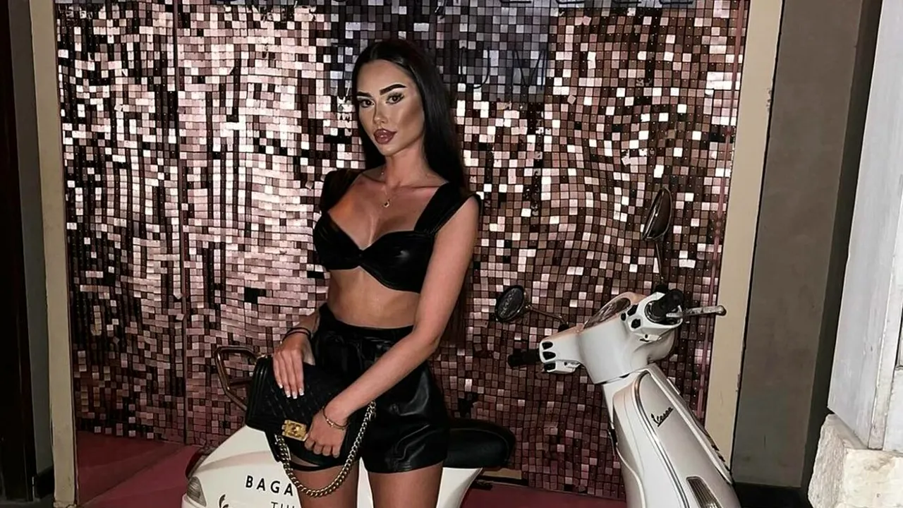 Bomba sexy care s-a iubit cu fiul lui Cristi Borcea continuă să facă ravagii cu imaginile provocatoare cu ea! S-a pozat într-o rochie cu un decolteu generos: „Roșu, ca un Ferrari”. GALERIE FOTO