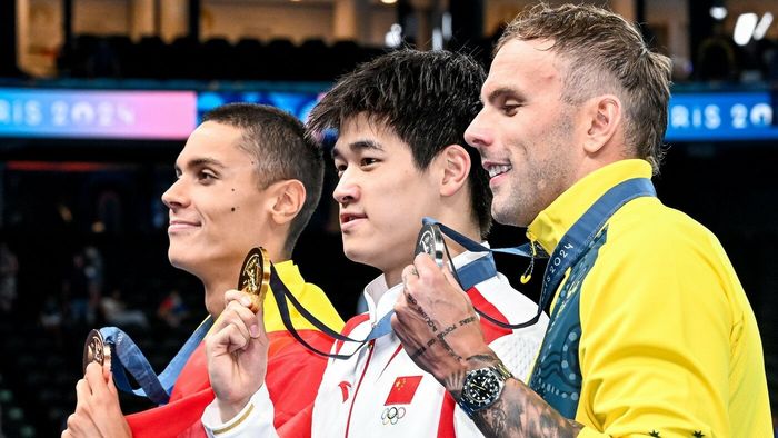 Reacția World Aquatics la imaginea cu David Popovici şi Zhanle Pan. Cum a numit interacțiunea dintre cei doi