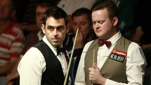 Ronnie O'Sullivan a profitat de căderea lui Murphy și se îndreaptă spre semifinalele Mondialului. Trump are 6-2 cu Robertson după prima sesiune