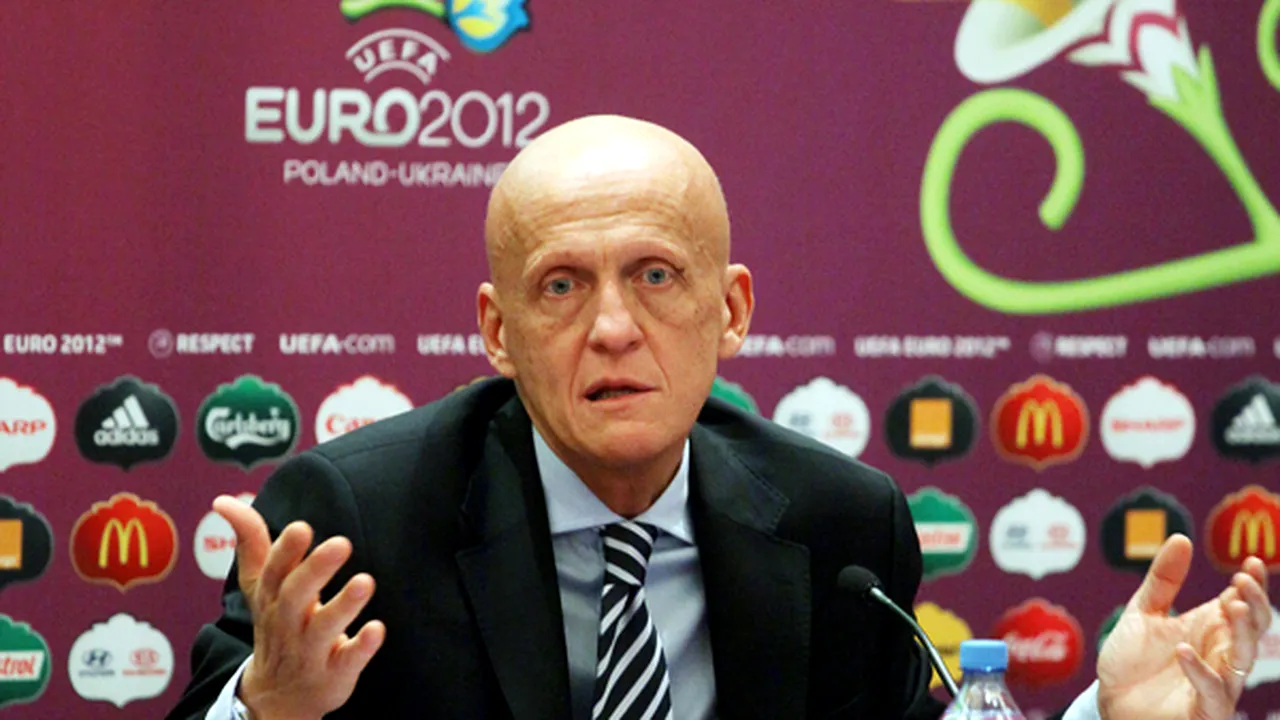 La EURO 2012,** jucătorii care se strâng în jurul arbitului și îi contestă deciziile vor fi sancționați