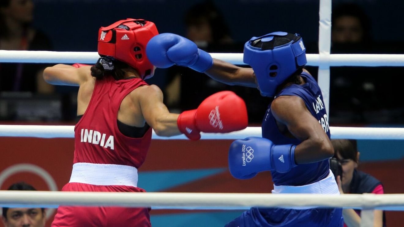 Prima boxeră care a câştigat aurul la Jocurile Olimpice şi-a părăsit iubita cu 15 mai tânără decât ea