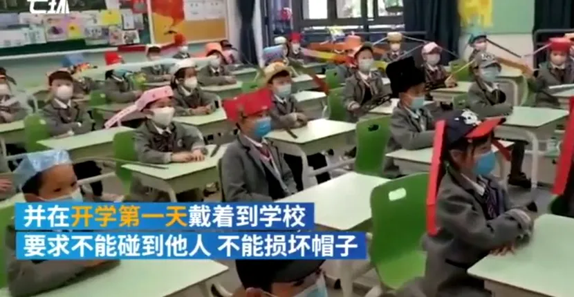 Măsuri incredibile de siguranță pentru elevii chinezi care s-au întors la școală. Soluția găsită pentru a păstra distanța