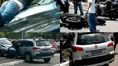 Scene de groaza pe sosea! VIDEO – Femeia care s-a urcat pe un motociclist cu SUV-ul