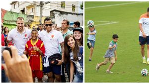 "Dădacă" la antrenament. Van Persie a avut grijă de copiii starurilor Olandei. Jucătorii lui Van Gaal au vizitat cea mai colorată favelă din Rio