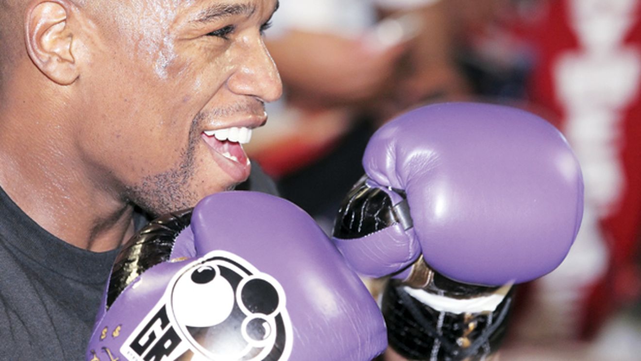 Un sac de dolari!** Nimeni nu știe exact suma câștigată de boxerul Floyd "Money" Mayweather după ce a pariat aproape două milioane de dolari pe un meci de baschet