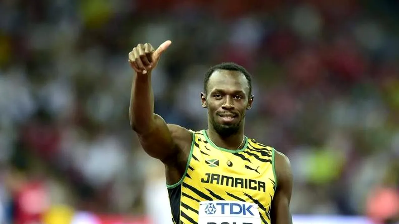 Usain Bolt, mereu surprinzător! Sportivul jamaican a urcat pe podiumul de premiere cu o cameră video. 