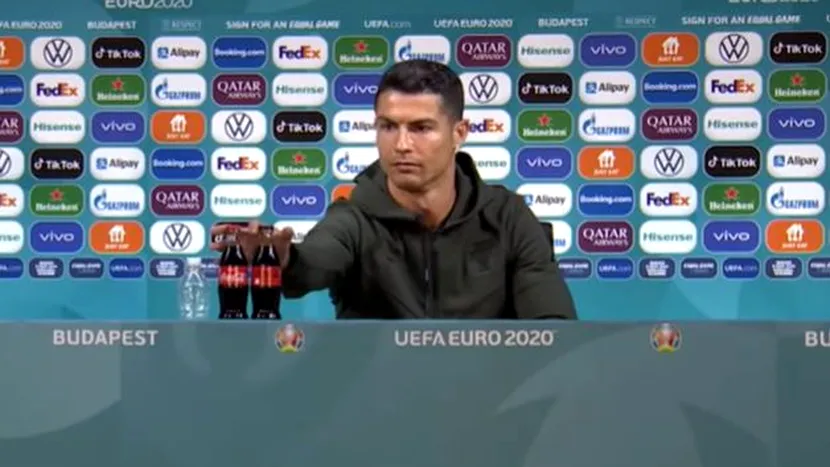 VIDEO / Cum a reacționat Coca-Cola după ce Cristiano Ronaldo a luat sticlele de suc de pe masă