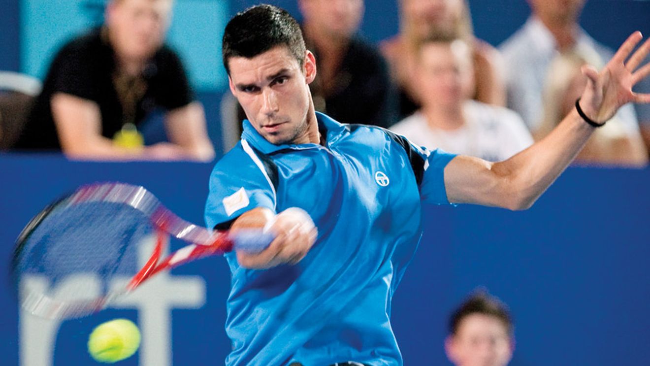 Hănescu, învins clar de Federer