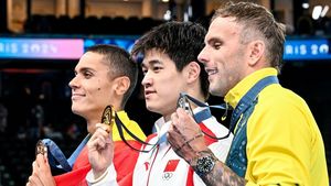 Reacția World Aquatics la imaginea cu David Popovici şi Zhanle Pan. Cum a numit interacțiunea dintre cei doi