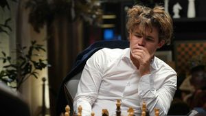 Moment istoric în șahul mondial: un copil de 10 ani l-a învins pe numărul 1, norvegianul Magnus Carlsen, în doar 48 de mutări!
