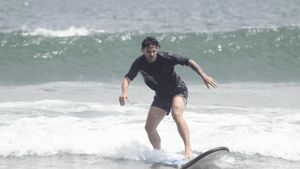 Din Giuleşti în Yunnan, un român a ajuns atât de apreciat în China încât i-au pictat chipul pe pereții blocurilor