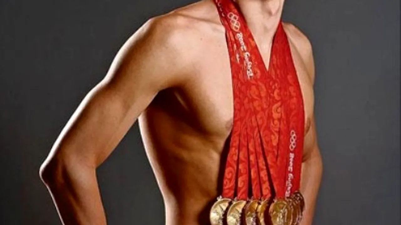 FOTOGRAFIA ZILEI / Aurul atârnă greu la gâtul lui Phelps