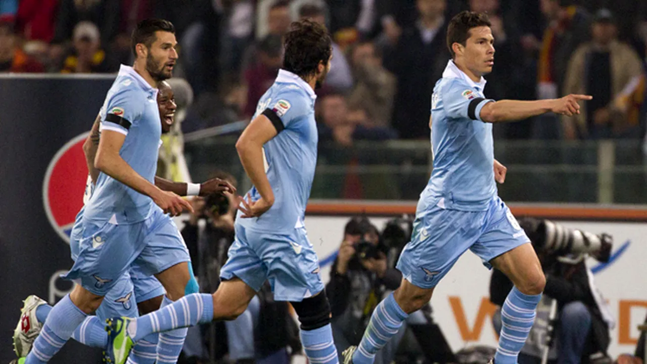 Derby nebun la Roma!** Hernanes le-a făcut pe toate: gol fabulos, penalty ratat și 11 metri provocat în propriul careu. Totti a intrat în istorie: Roma-Lazio 1-1