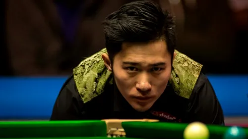 Mafia pariurilor zguduie China. Doi jucători de snooker au fost suspendați, după ce ar fi trucat meciuri cu finaliști de Campionat Mondial