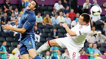 Un șut în fund, un pas înainte! Impresionanta poveste a lui Adil Rami, jucătorul pe care-l înfruntă Șevcenko!** De la grădinar și gunoier la fotbalist