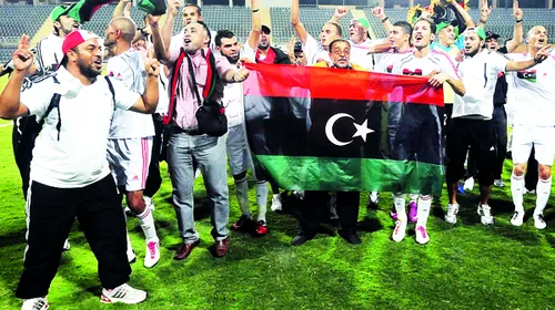 De pe teren pe front!** Și iar pe teren! Povestea fotbalului libian până la moartea lui Gaddafi