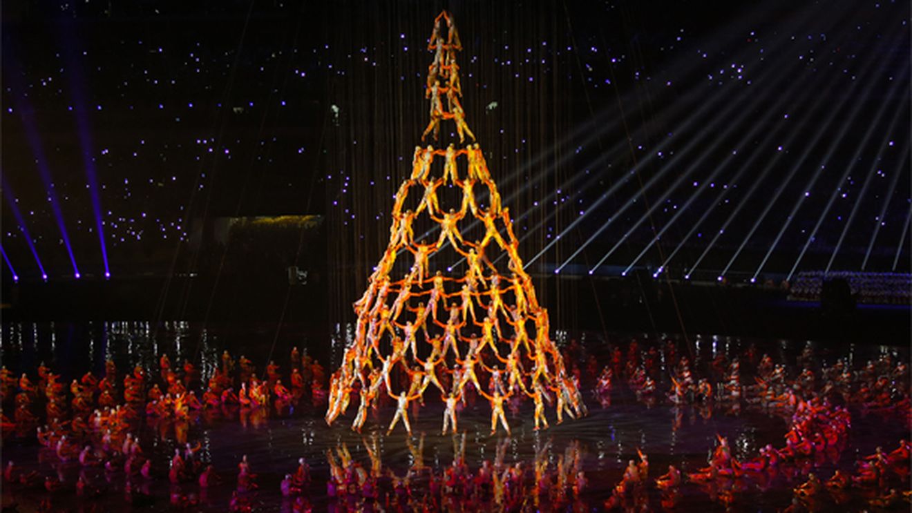 Olimpiada de Tineret: chinezii au încercat să împrăștie norii cu tehnologia de control meteorologic. Rezultatul: ceremonia de deschidere de la Nanjing s-a desfășurat sub o ploaie torențială
