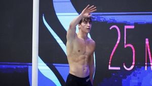 Decizia inamicului rus al lui David Popovici! Antrenorul lui Phelps și Marchand l-a ofertat pe Kornev
