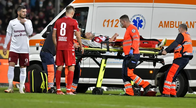 Șoc în timpul derby-ului Dinamo - Rapid! Alexandru Răuță, luat cu ambulanța de pe teren și dus la spital. „Avea probleme respiratorii!” + Prima reacție a fotbalistului| FOTO